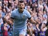 TOPSHOTS Manchester City's Argentinian striker Sergio Aguero celebrates scoring his, and their third goal from the penalty spot during the English Premier League football match between Manchester City and Tottenham Hotspur at the The Etihad Stadium in Manchester, north west England on October 18, 2014. AFP PHOTO/OLI SCARFF RESTRICTED TO EDITORIAL USE. NO USE WITH UNAUTHORIZED AUDIO, VIDEO, DATA, FIXTURE LISTS, CLUB/LEAGUE LOGOS OR “LIVE” SERVICES. ONLINE IN-MATCH USE LIMITED TO 45 IMAGES, NO VIDEO EMULATION. NO USE IN BETTING, GAMES OR SINGLE CLUB/LEAGUE/PLAYER PUBLICATIONS.