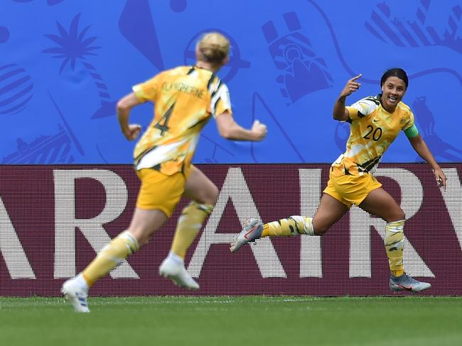 VALENCIENNES, FRANCE - JUNE 09: Sam Kerr (R) of Australia celebrates after scoring the opening goal during the 2019 FIFA Women's World Cup France group C match between Australia and Italy at Stade du Hainaut on June 09, 2019 in Valenciennes, France. (Photo by Tullio M. Puglia/Getty Images)