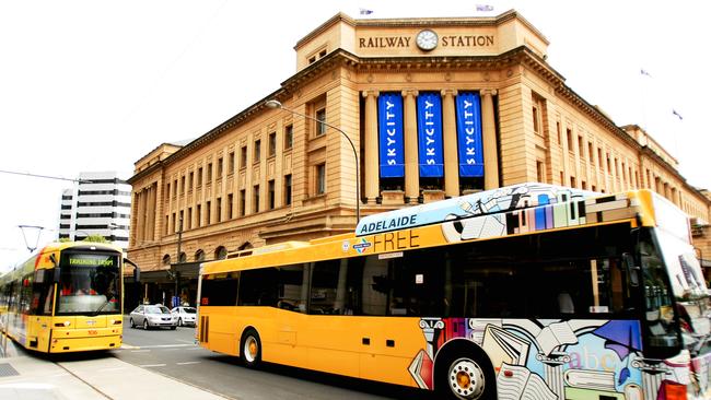 Tram passing Adelaide Railway Station on North Tce.