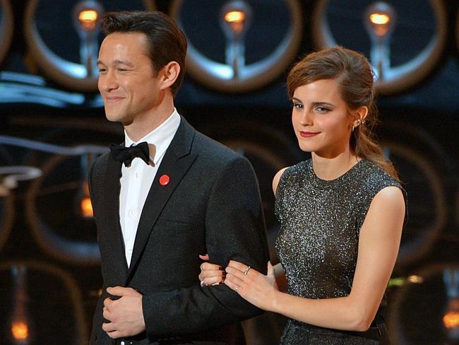 Actors Joseph Gordon-Levitt and Emma Watson on stage during the Oscars.