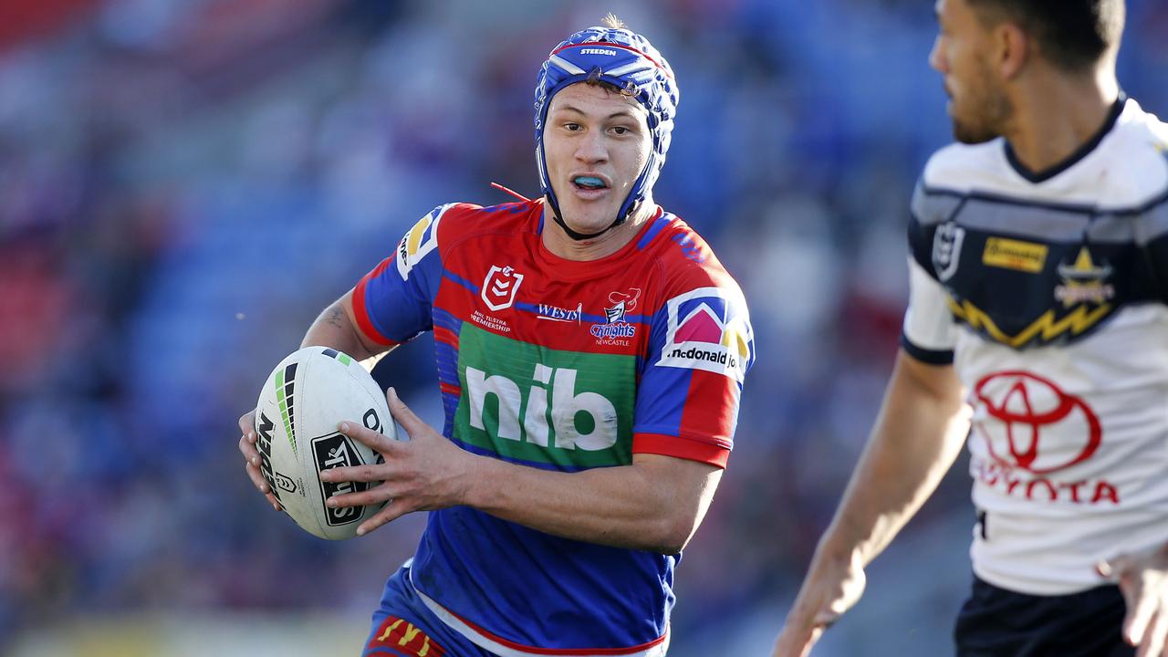 Kalyn Ponga of the Knights hits a gap to score a try