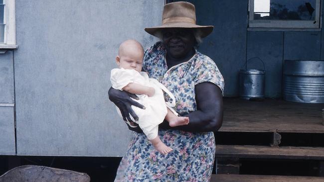 The author as a baby in the arms of Mary Butcher.