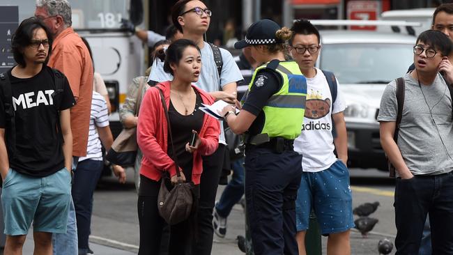 Police crack down on jaywalkers in the city | Herald Sun