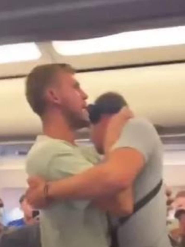 A passenger jumped out of their seat and pinned the man to the floor. Picture: TikTok