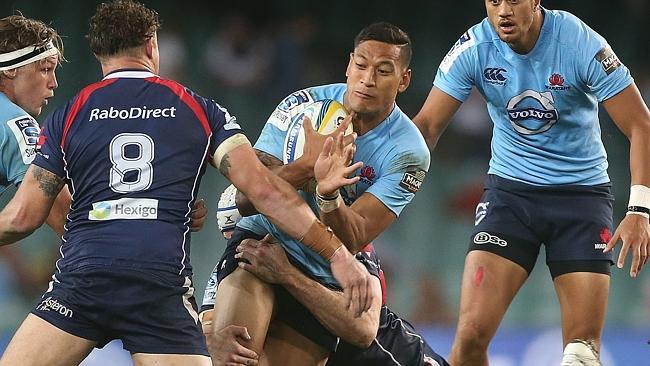 SYDNEY, AUSTRALIA - MARCH 21: Israel Folau of the Waratahs is tackled during the round six Super Rugby match between the Waratahs and the Rebels at Allianz Stadium on March 21, 2014 in Sydney, Australia. (Photo by Mark Metcalfe/Getty Images)