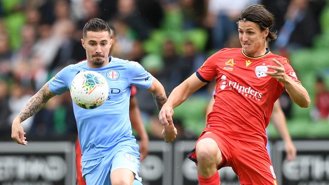 City striker Jamie Maclaren (left) will be hoping to pick up where he left off — with a swag of goals when the season resumes. Picture: Getty Images