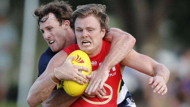 Gold Coast’s Nick Holman found plenty of the ball. Picture: AAP