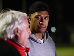 GOLD COAST, AUSTRALIA - MAY 27: Clive Palmer and Israel Folau talk at Owen Park on May 27, 2021 in Gold Coast, Australia. (Photo by Chris Hyde/Getty Images)