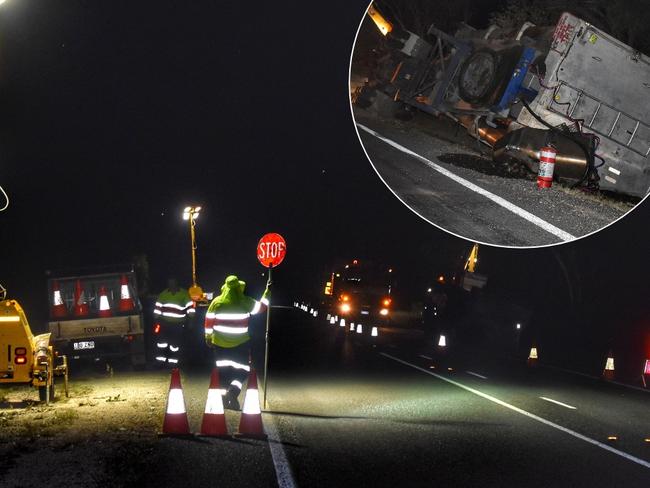 Truckie flees highway crash as toxic sludge leaks from truck