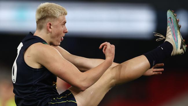 Nate Caddy takes a kick in the match between the Australian under 18s and Carlton at Marvel Stadium. Pic: Michael Klein