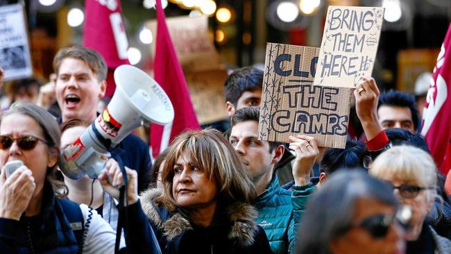 SPEAKING OUT: People protesting against mandatory offshore detention during the Evacuate Manus and Nauru Protest in Sydney earlier this year. Next month about 500 teachers plan to walk off the job to join a national protest to get the remaining children off Nauru. Picture: AAP/JEREMY NG