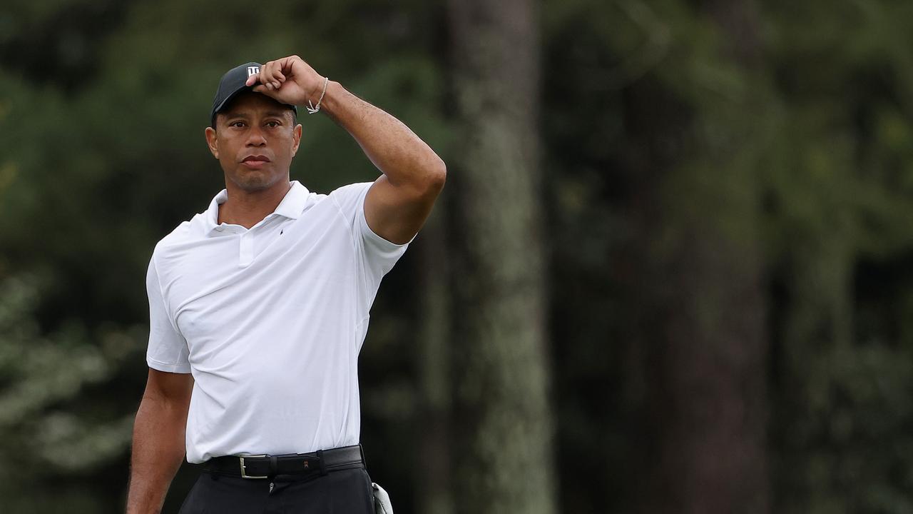 AUGUSTA, GEORGIA - APRIL 06: Tiger Woods of the United States looks on over the 18th hole during a practice round prior to the Masters at Augusta National Golf Club on April 06, 2022 in Augusta, Georgia. (Photo by Jamie Squire/Getty Images)