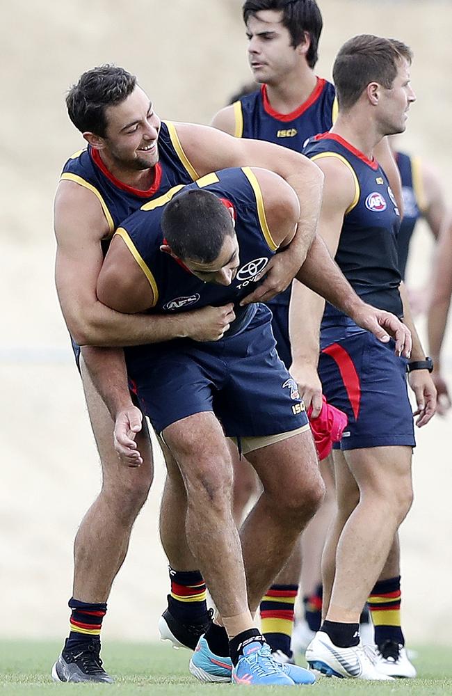 Walker and Rory Atkins share a joke at training. Picture: Sarah Reed.