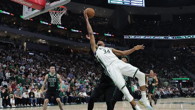 MILWAUKEE, WISCONSIN - MAY 09: Giannis Antetokounmpo #34 of the Milwaukee Bucks is fouled by Al Horford #42 of the Boston Celtics during the second half of Game 4 of the Eastern Conference Semifinals at Fiserv Forum on May 09, 2022 in Milwaukee, Wisconsin. NOTE TO USER: User expressly acknowledges and agrees that, by downloading and or using this photograph, User is consenting to the terms and conditions of the Getty Images License Agreement. (Photo by Stacy Revere/Getty Images)