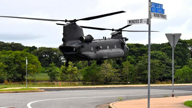 A Singapore air force CH-47F Chinook Helicopter landing outside Ingham State High School on Sunday. The floods in Hinchinbrook Shire, North Queensland. Picture: Cameron Bates