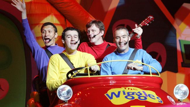 The Wiggles driving their Big Red Car. Picture: Steve Pohlner