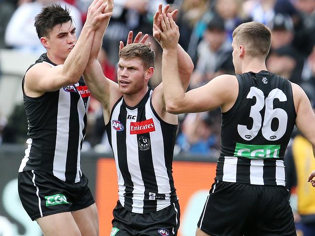 Round 18. 21/07/2018. Collingwood v North Melbourne at the MCG.  Collingwood's Taylor Adams celebrates his goal in the first quarter   . Pic: Michael Klein