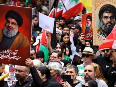 Hundreds of protesters including some carrying pictures of the recently assassinated Hezbollah leader Hasan Nasrallah, blocked traffic as they marched through Sydney CBD on Sunday afternoon.