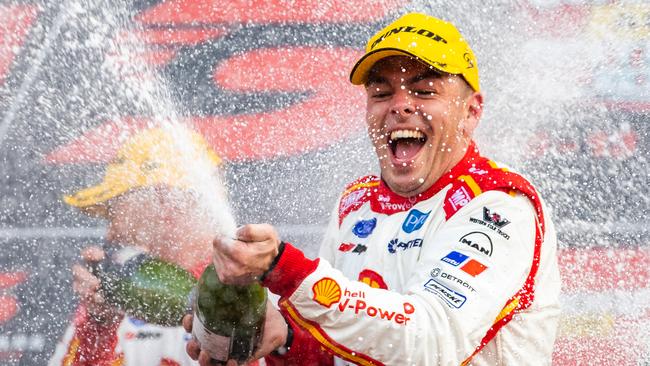 Scott McLaughlin celebrates on the podium. Picture: Daniel Kalisz/Getty