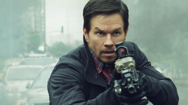 This cover image released by STXfilms shows Mark Wahlberg in a scene from "Mile 22." (STXfilms via AP)