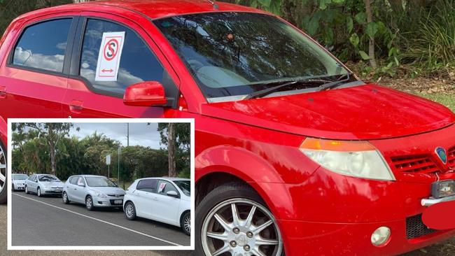 A ‘phantom’ has been putting warning signs on cars parked illegally at the Weinam Creek ferry terminal at Redland Bay, near where a teen was critically injured in April. Many who have parked at the terminal have received police and council fines.