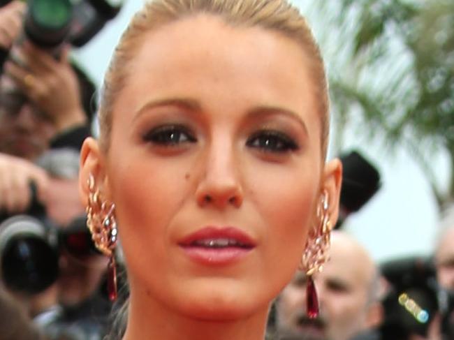 FILE - In this May 14, 2014 file photo, American actress Blake Lively poses for photographers on the red carpet during the opening ceremony and the screening of "Grace of Monaco" at the 67th international film festival, Cannes, southern France. Marsala, the wine-influenced, red-kissed color of 2015, was chosen by Pantone. Pantone's yearly picks can herald a marked presence of a color in fashion, beauty, housewares, home design and consumer packaging, though some years the influence is stronger than others. (Photo by Joel Ryan/Invision/AP, File)