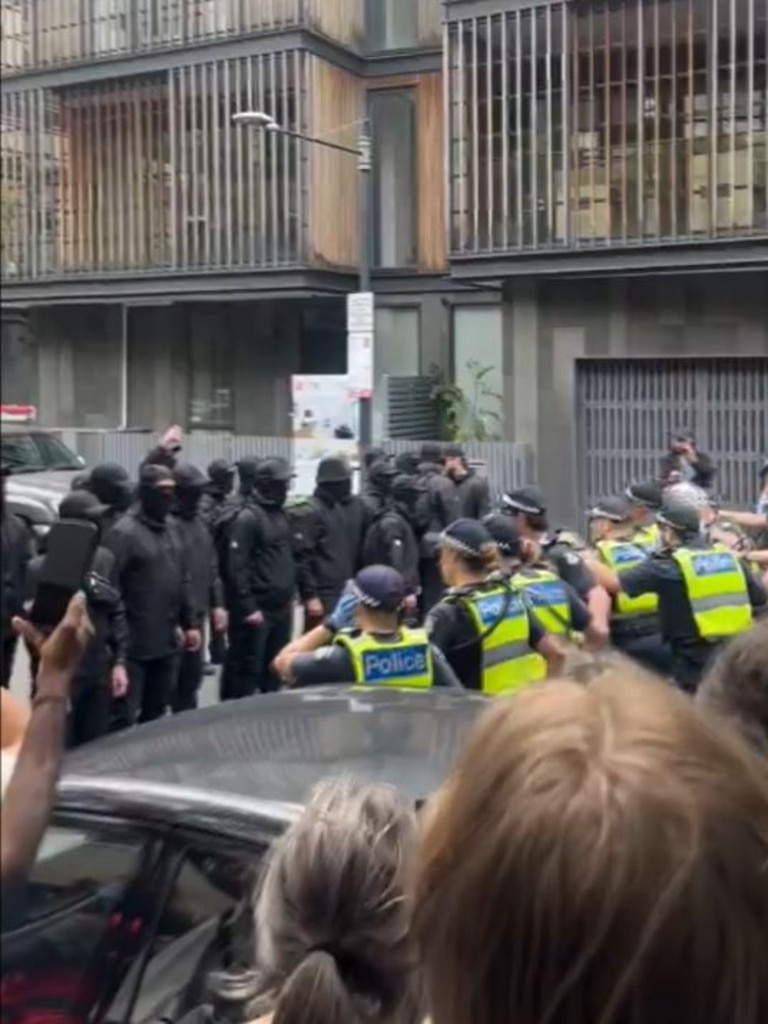 A group of alleged neo-Nazis faced off with police after gatecrashing a refugee protest. Picture: X