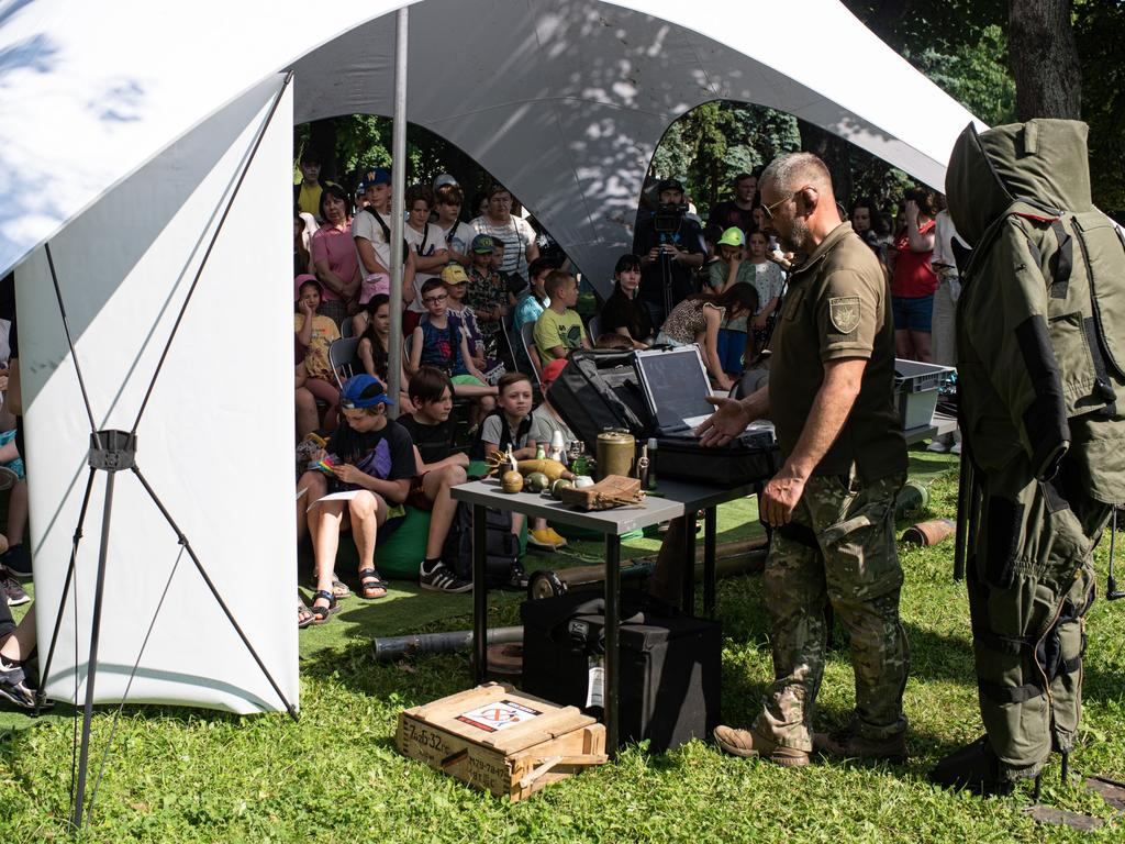 A police officer talks about mine safety during a public mine safety lesson in Kyiv, Ukraine. Picture: Getty Images