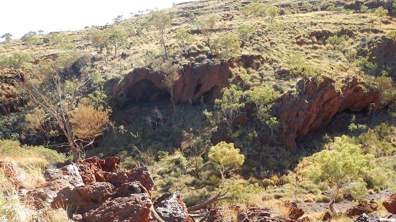 A photo taken on June 2, 2013 and released by the PKKP Aboriginal Corporation shows Juukan Gorge in Western Australia – one of the earliest known sites occupied by Aboriginals in Australia.