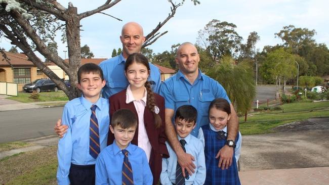 Craig and Cameron Zammit with their children. Picture: Construction, Forestry, Mining and Energy Union