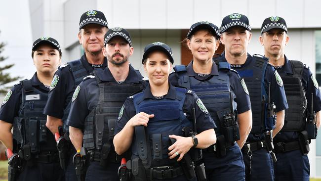 Community constable Reeda Zaffar, Senior Sgt Vince Scotland, Sgt Chris Head, Community constable Lauren Lovell, Sgt Annette Gilbert, Sgt Daniel Lissiman and Senior Constable 1st Class David Fox pose in the Safety Vests being trialled by SA Police in 2019. Picture: AAP/Mark Brake