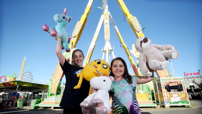 Ayla, 11, and Chloe Chivers, 9, from Malanda get excited for the 2019 Cairns Show.