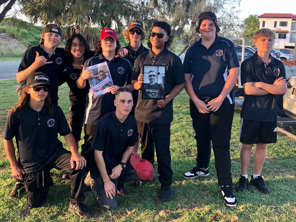 Mackay Project Booyah graduates (back) Damian Walker, Jaylm Peepe, Darnell Woodrow, Xander Davis, Taratoa Onekawa, Jayce Stanley, Alex Doyle and (front) Bayden Wilson and Billy Nunn. Two boys are holding a photo of Jack Evans who sadly died before the program finished. Picture: Danica Crebbin