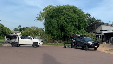 NT police and forensic officers at the scene where a 67-year-old wheelchair-bound man was attacked and bashed in his own home overnight. Picture: Katrina Bridgeford