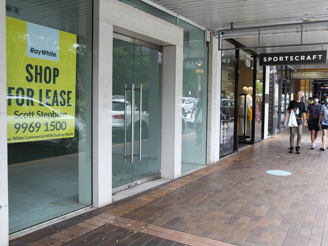 SYDNEY, AUSTRALIA - NewsWire Photos JANUARY, 19, 2021: A view of a vacant shop with a for lease sign on the main shopping street in Mosman as the locals are seen walking by with face masks on, living with Covid-19 restrictions in Sydney, Australia. Picture: NCA NewsWire / Gaye Gerard