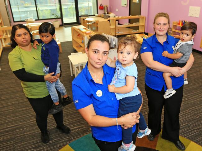 Childcare operators facing COVID crunch due to plummeting enrolments and fees continuing to be levied. at Precious Cargo in Heatherton. L to R Lalita Karate with Daivik, 4, Jenny Antoniou with Antonia, 1, and Caitlin Smith with Ayman, 1. Picture: Mark Stewart