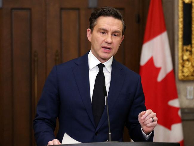 Canadian Conservative Party leader Pierre Poilievre speaks during a news conference on Parliament Hill on December 16, 2024 in Ottawa. Deputy Prime Minister Chrystia Freeland in a surprise announcement on Monday quit over disagreements with Justin Trudeau on Canada's response to US President-elect Donald Trump's tariff threats. (Photo by Dave Chan / AFP)