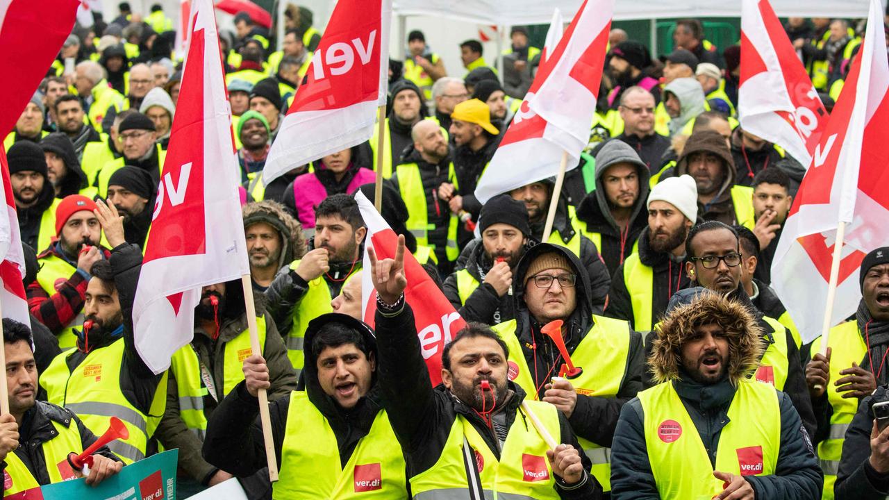 Protesters and members of trade union demonstrate as they stage a strike, at Frankfurt Airport. Picture: Andre Pain / AFP