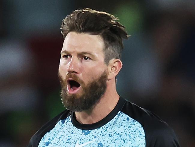 CANBERRA, AUSTRALIA - DECEMBER 12:  Michael Neser of the Heat celebrates taking the wicket of Alex Hales of the Thunder during the BBL match between Sydney Thunder and Brisbane Heat at Manuka Oval, on December 12, 2023, in Canberra, Australia. (Photo by Matt King/Getty Images)