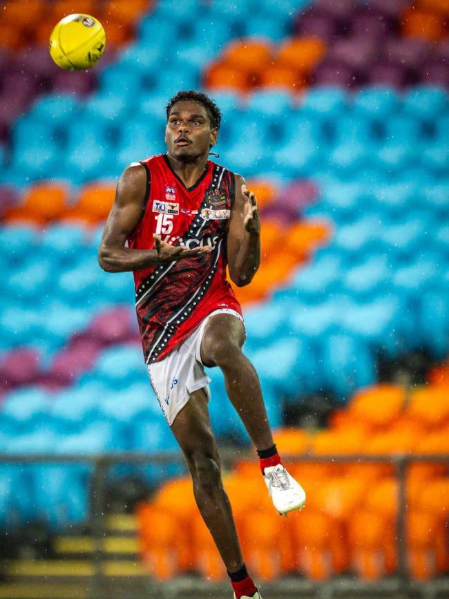 Edward Darcy playing for the Tiwi Bombers in the 2024-25 NTFL season. Picture: Patch Clapp / AFLNT Media