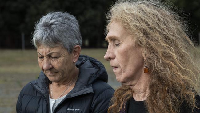 Rosemary Harwood (the mother of Marjorie Harwood, a trans woman who was raped at Risdon Prison and died soon after her release) and Martine Delaney outside Risdon Prison at the vandalised memorial. Picture: Chris Kidd