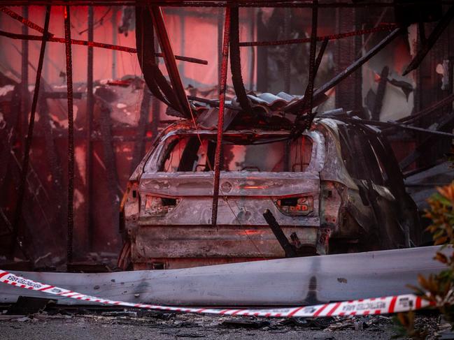 MELBOURNE, AUSTRALIA. NewsWire Photos. JULY 2ND, 2024. A car has crashed into the garage of a house in Melbourne's north, burst into flames and causing a serious house fire. The vehicle smashed into the property on Arkose St in Greenvale at 3.45am on Tuesday. Picture: NewsWire/Jake Nowakowski