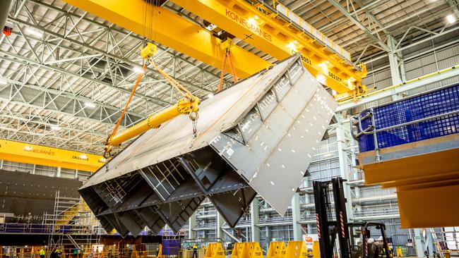 Equal to the size of two houses and taking 45,000 hours, the first steel prototype 'block' has been constructed by shipbuilders working on the Hunter-class frigate program. Picture: James Elsby/ BAE Systems Australia