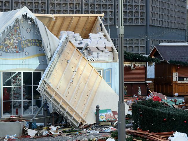 The wrecked remains of the Christmas market stand two days after a man drove a heavy truck into the market in an apparent terrorist attack, killing 12 people. Picture: Sean Gallup
