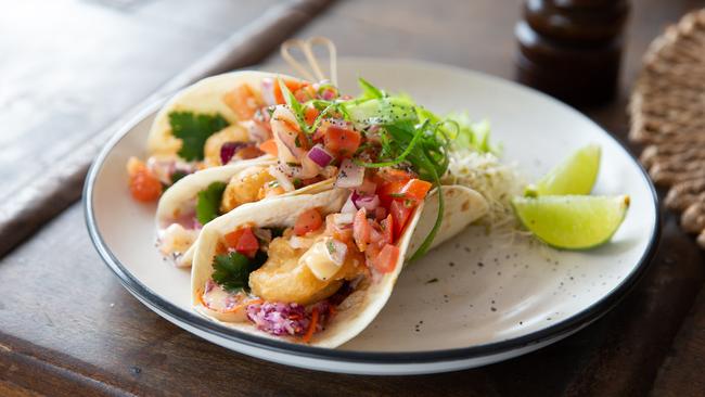 The beer-battered barramundi tacos at Flora Social Eatery.