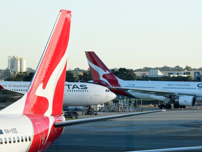 Qantas aircraft are seen on the tarmac at Sydney Airport, Adelaide, Wednesday, May 8, 2019. (AAP Image/Bianca De Marchi) NO ARCHIVING