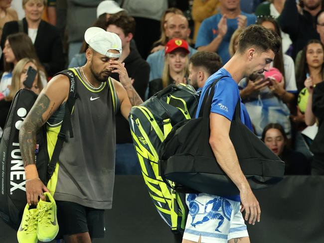 MELBOURNE, AUSTRALIA - JANUARY 16: Nick Kyrgios and Thanasi Kokkinakis of Australia look dejected as they leave John Cain Arena after retiring in the Men's Doubles First Round match against James Duckworth and Aleksandar Vukic of Australia during day five of the 2025 Australian Open at Melbourne Park on January 16, 2025 in Melbourne, Australia. (Photo by Cameron Spencer/Getty Images)