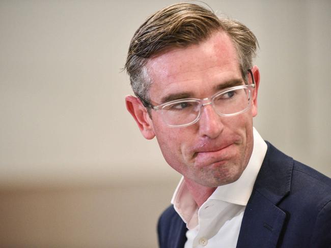 SYDNEY, AUSTRALIA - NewsWire Photos , November 7, 2021: NSW Premier Dominic Perrottet looks up during press conference in Sydney.  Picture: NCA NewsWire / Flavio Brancaleone