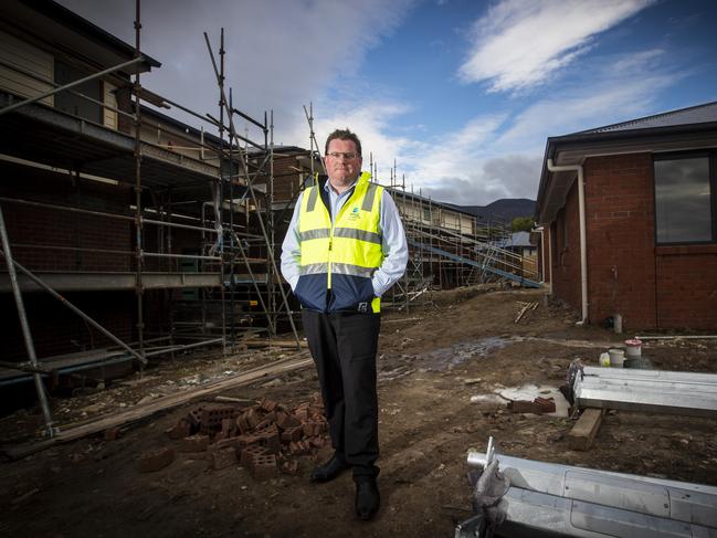 CentaCare Evolve Housing CEO Ben Wilson at a construction site in Glenorchy. Picture: LUKE BOWDEN