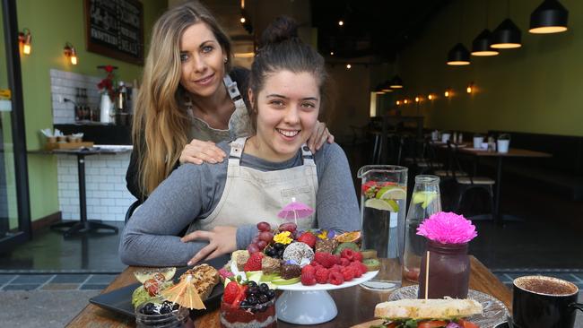 Mum Claire Wright with daughter and vegan guru Amba at their new Burleigh eatery SeraBar. Picture Glenn Hampson